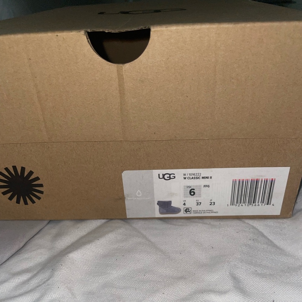 Size 6, light purple UGG boots. Lightly worn